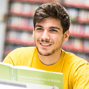 Be inspired  student in Berkeley's library mobile image