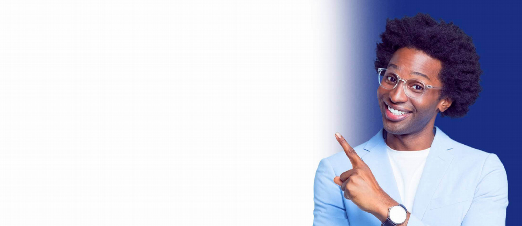 Smiling person with curly hair, wearing glasses and a light blue blazer, pointing with one finger. The background is a gradient of blue to white.