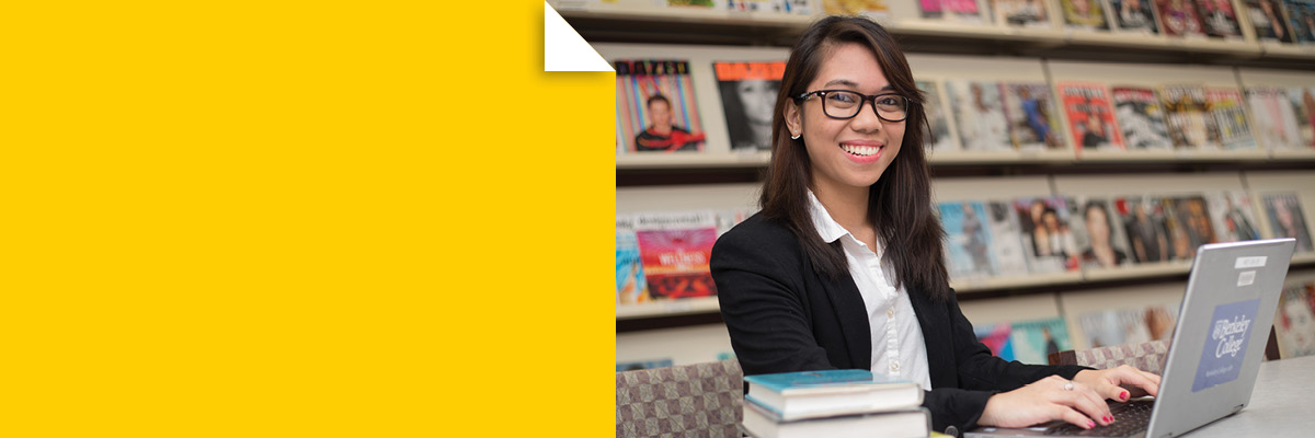 Photo of Berkeley College student on laptop