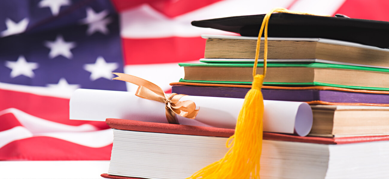 books and the united states flag on the background