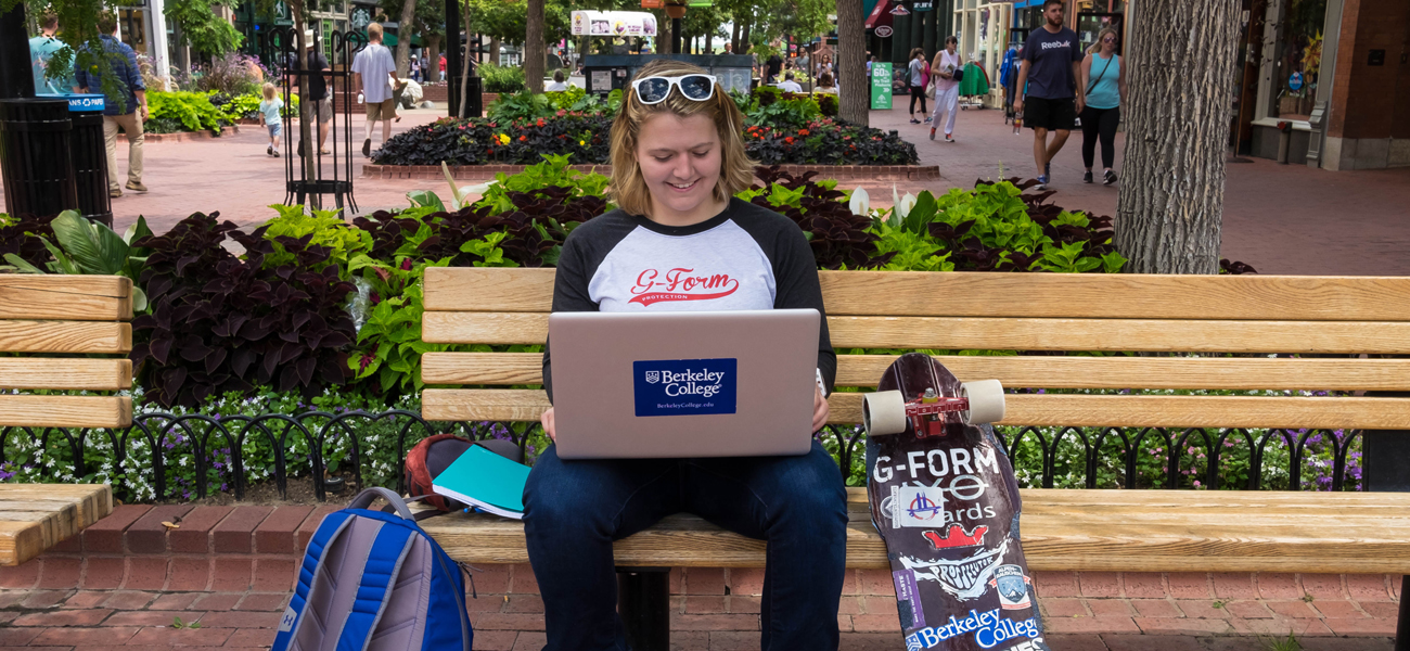 Emily Pross at computer