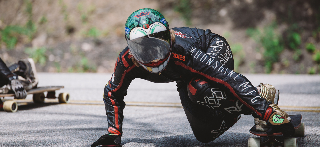 Emily Pross on longboard