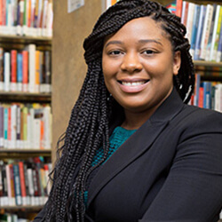 Headshot of Lachanee Scott in a library