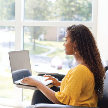 Girl with laptop mobile image
