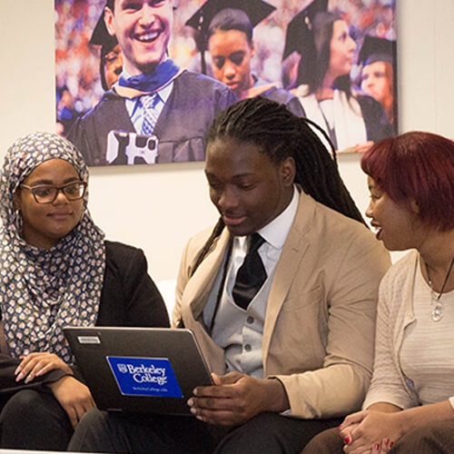 Image for mobile devices: Group of 7 students sitting on couch looking at laptop