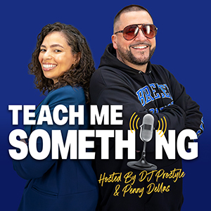 A man and woman stand back to back and smile at the camera