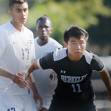 image of students playing soccer mobile image