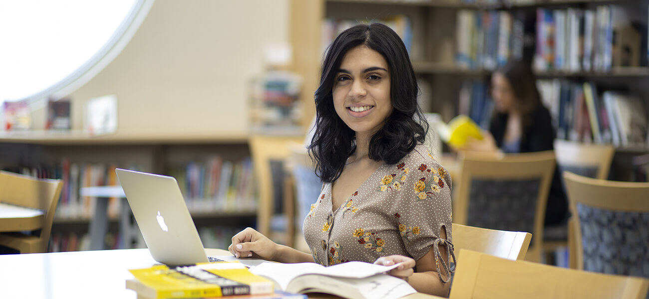 image of student with computer