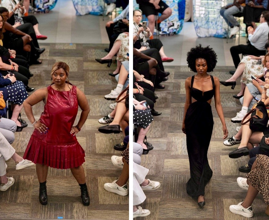 Student models pose at the end of a runway.
