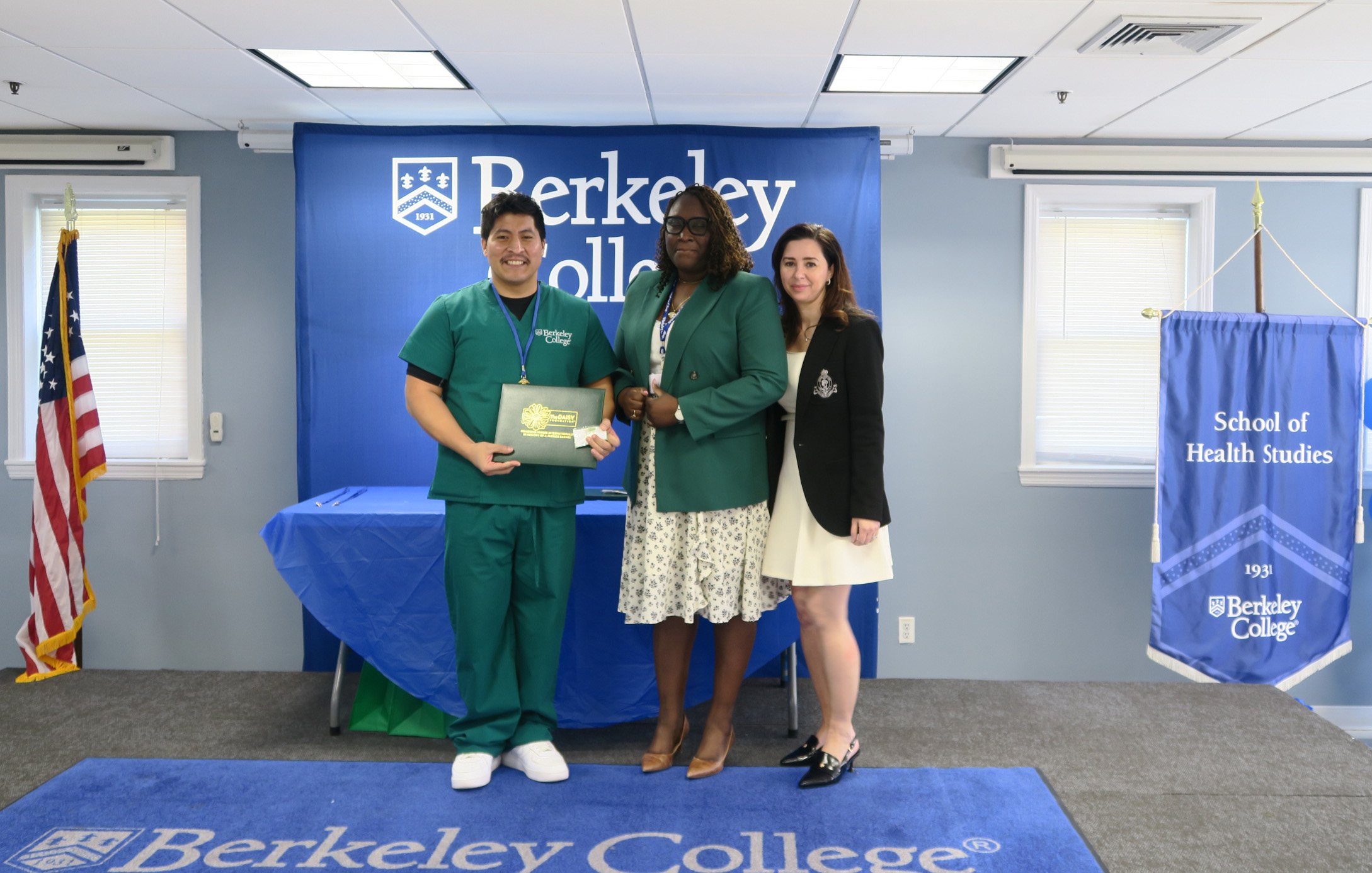 Bachelor of Science in Nursing graduate and U.S. Army veteran Steven Alonzo of Tuxedo Park, NY, receives the Daisy Award at Berkeley College in Woodland Park, NJ, on Friday, April 18, 2025. Pictured (L to R) are Alonzo; Camile Richards, RN, Professor, Nursing, Berkeley College School of Health Studies; and Caterina Sousa, RN, FNP-C, Master of Science in Nursing Program Director, Berkeley College School of Health Studies.