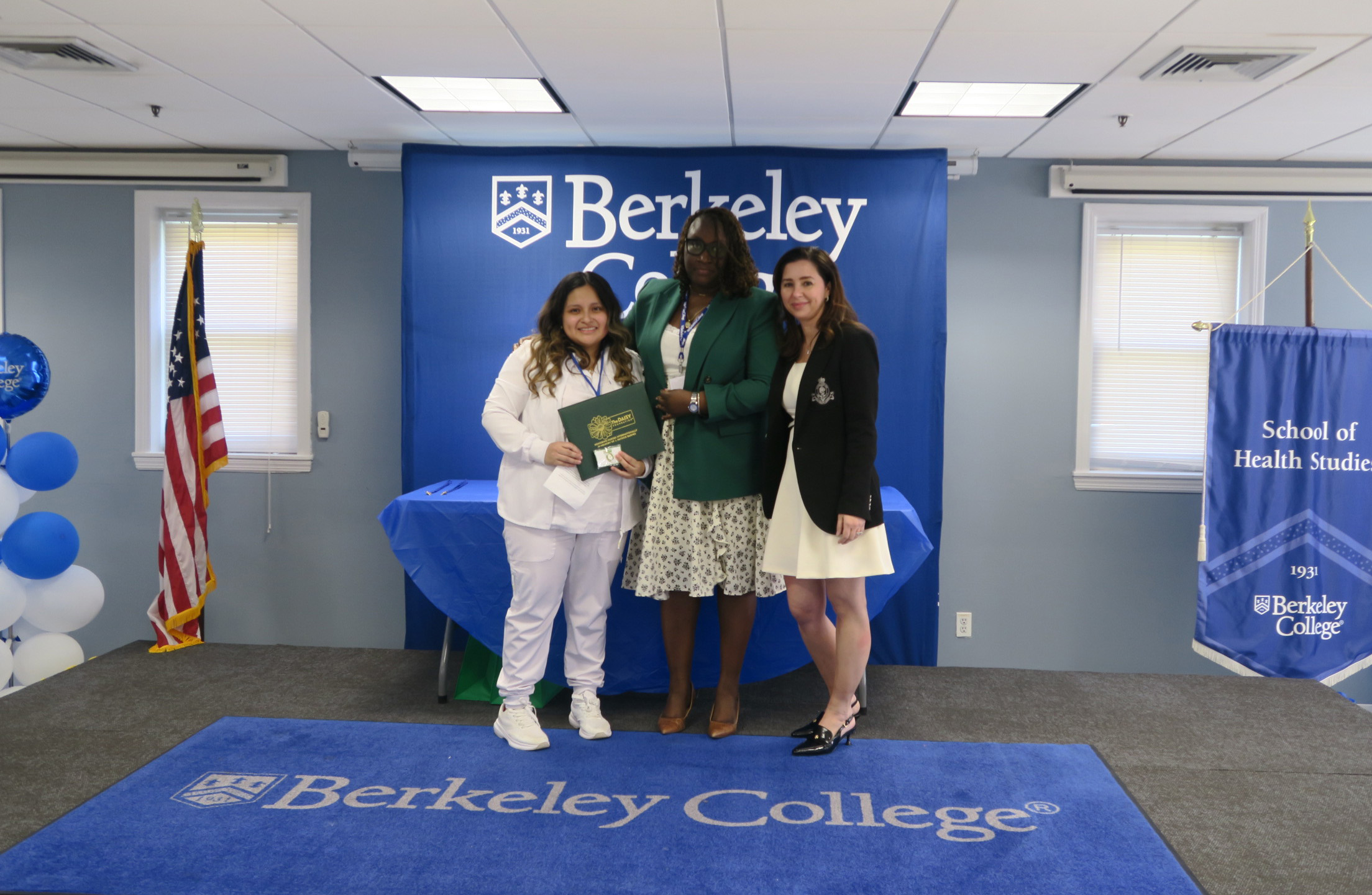 Practical Nurse graduate Jessica Carchi of Hackensack, NJ, receives the DAISY Award at Berkeley College in Woodland Park, NJ, on Friday, April 18, 2025. Pictured (L to R) are Carchi; Camile Richards, RN, Professor, Nursing, Berkeley College School of Health Studies; and Caterina Sousa, RN, FNP-C, Master of Science in Nursing Program Director, Berkeley College School of Health Studies.